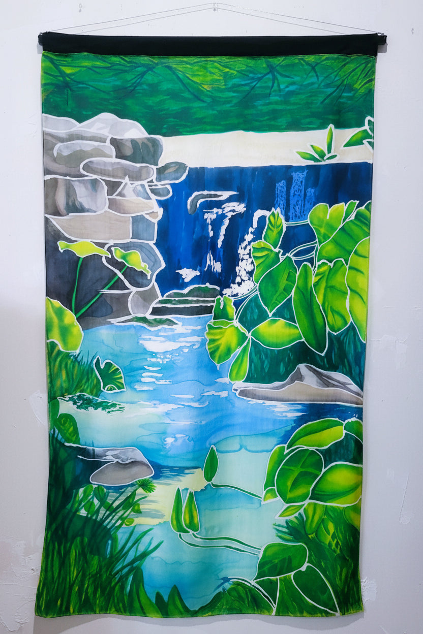 Large original hand-painted silk tapestry featuring lush jungle waterfall and pond by Amy Bridges