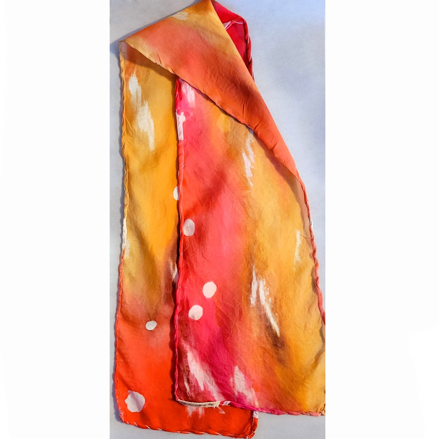 silk scarf red and yellows with spots and feathery textures