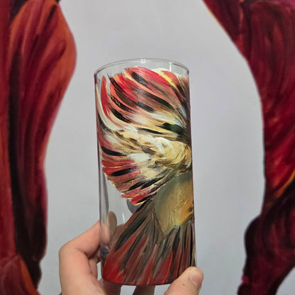 Hand-painted 16 oz tall tumbler with a female cardinal spreading her wings among large pink blossoms