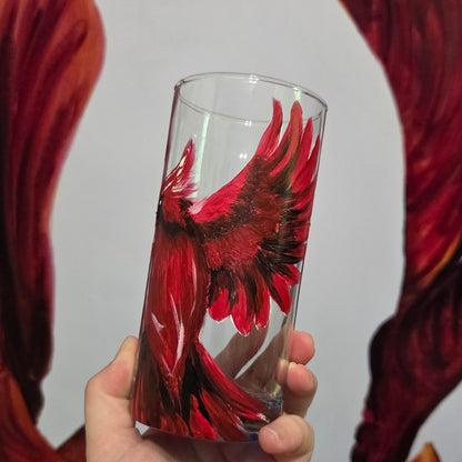 Hand-painted 16 oz tumbler featuring a bold red cardinal facing forward with wings spread wide