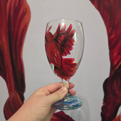 Hand-painted 16 oz goblet with a bold red cardinal facing forward and spreading his wings