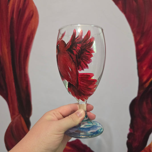 Hand-painted 16 oz goblet with a bold red cardinal facing forward and spreading his wings