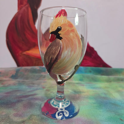 Hand-painted 16 oz goblet with a female cardinal looking over her shoulder, perched on a branch with peach-pink coloring