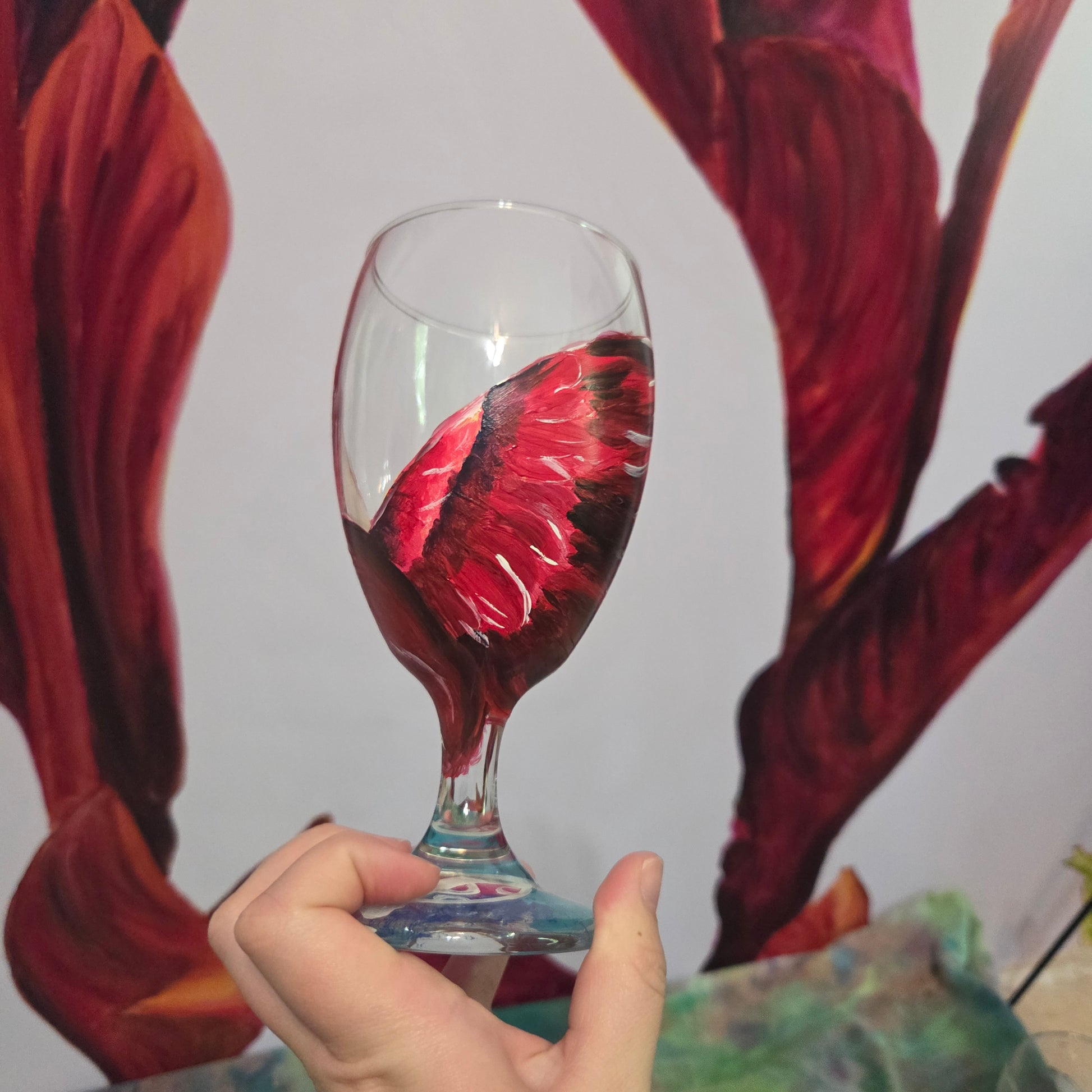Hand-painted 16 oz goblet with a dramatic red male cardinal and enormous wings spreading up and around the glass