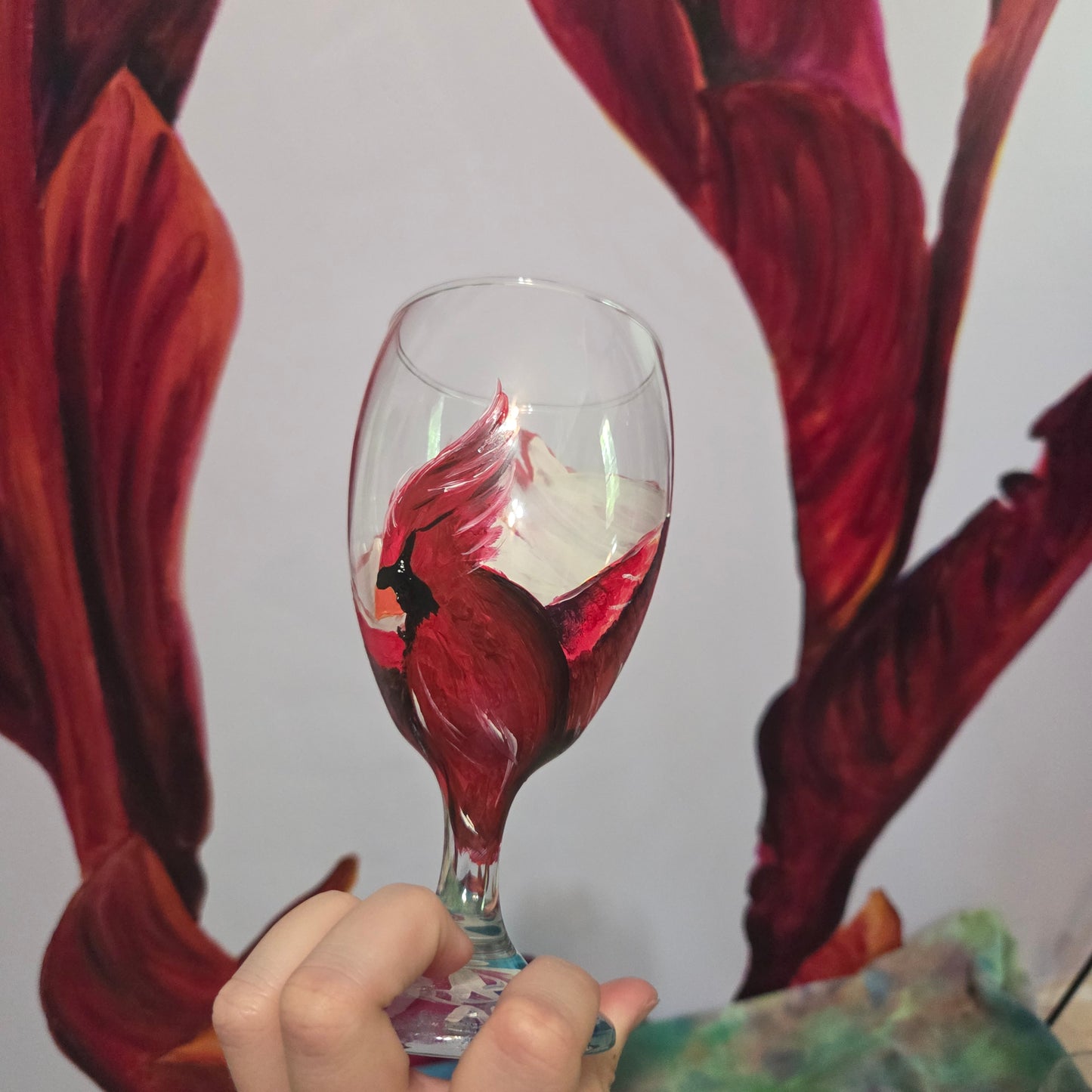 Hand-painted 16 oz goblet with a dramatic red male cardinal and enormous wings spreading up and around the glass