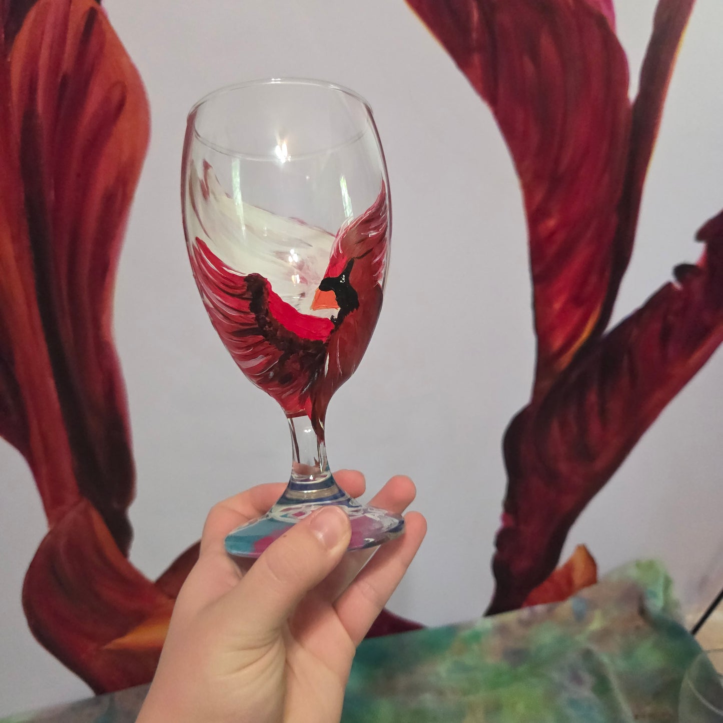 Hand-painted 16 oz goblet with a dramatic red male cardinal and enormous wings spreading up and around the glass