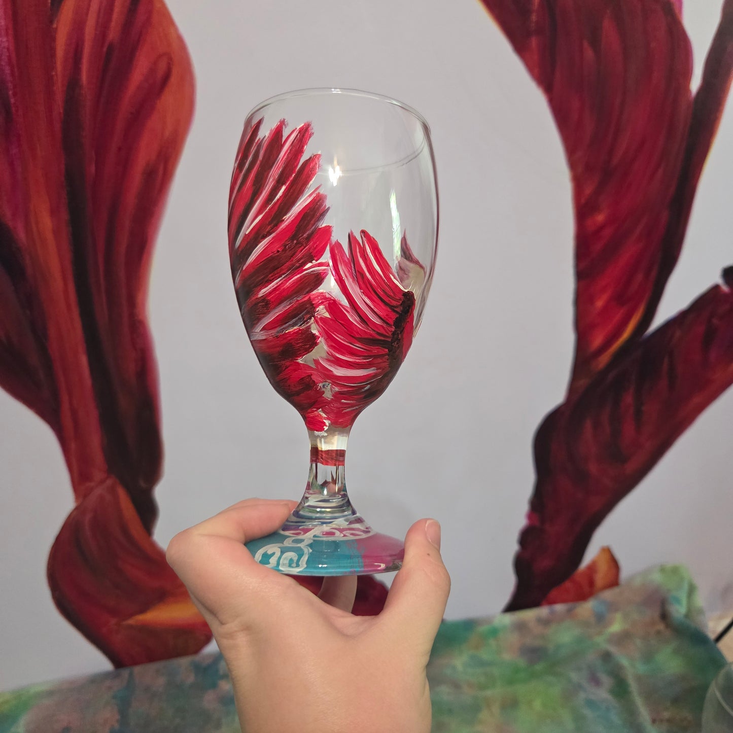 Hand-painted 16 oz goblet with a dramatic red male cardinal and enormous wings spreading up and around the glass