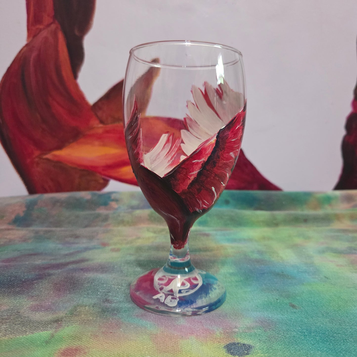 Hand-painted 16 oz goblet with a dramatic red male cardinal and enormous wings spreading up and around the glass