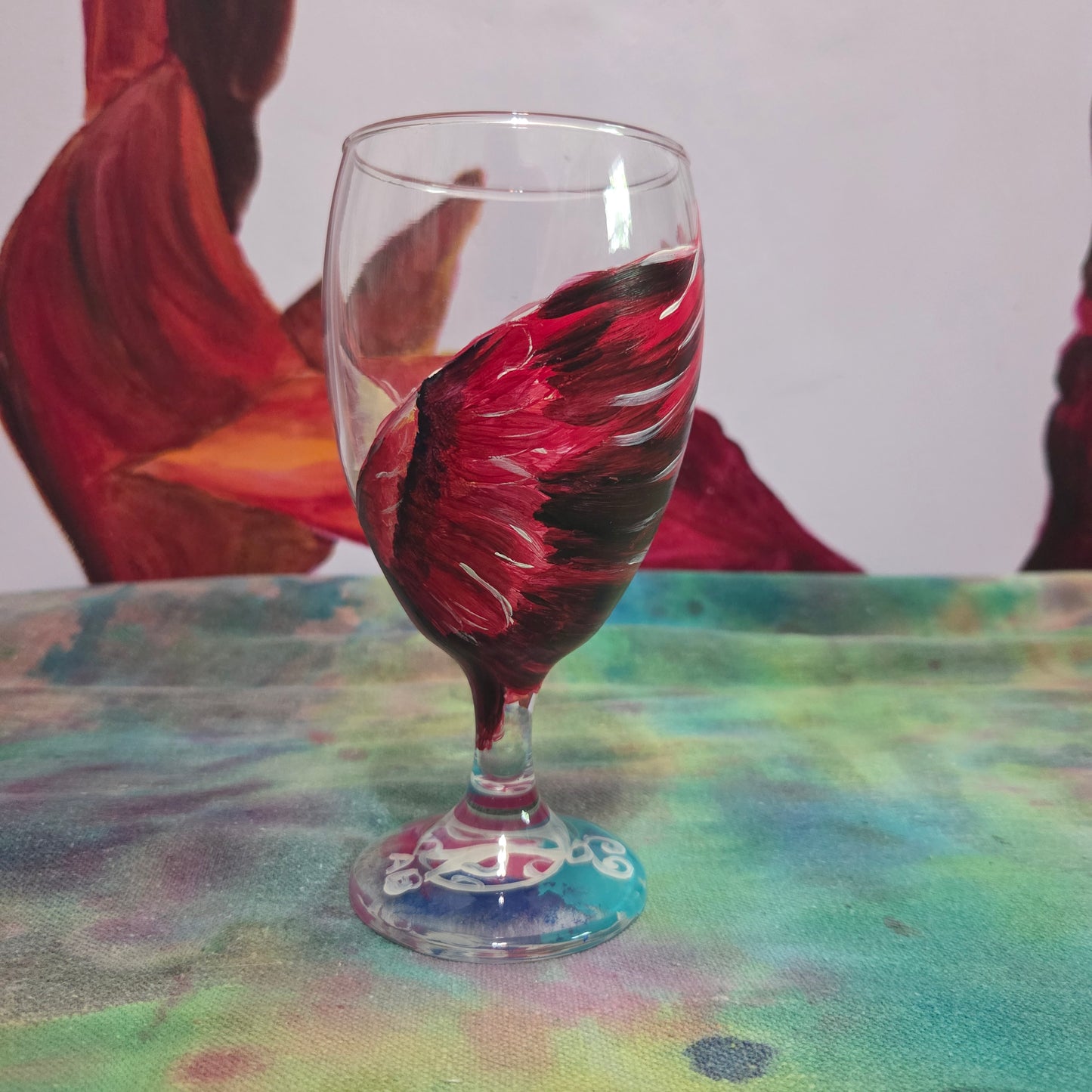 Hand-painted 16 oz goblet with a dramatic red male cardinal and enormous wings spreading up and around the glass