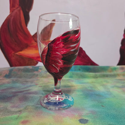Hand-painted 16 oz goblet with a dramatic red male cardinal and enormous wings spreading up and around the glass