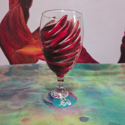 Hand-painted 16 oz goblet with a dramatic red male cardinal and enormous wings spreading up and around the glass