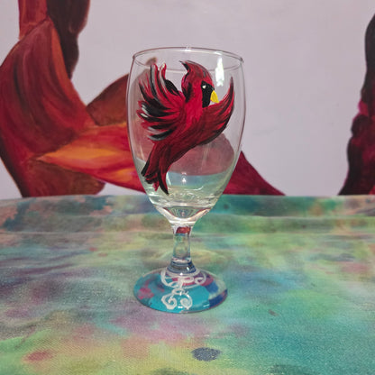 Hand-painted 16 oz goblet featuring a complete red cardinal in flight with bold black and white details