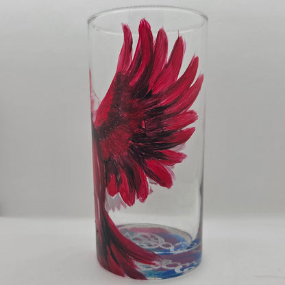 Hand-painted 16 oz tumbler featuring a bold red cardinal facing forward with wings spread wide
