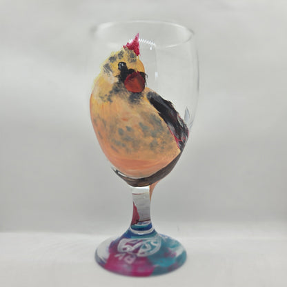 Hand-painted 16 oz goblet with a fluffy cream-colored female cardinal with pink accents and wings tucked behind her back