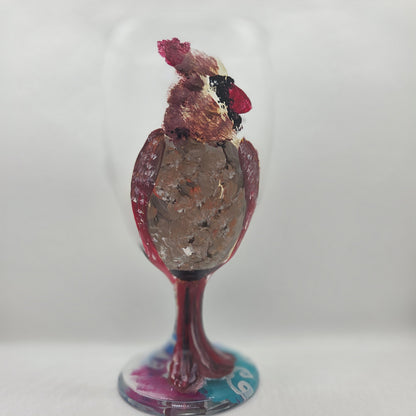 Hand-painted 16 oz goblet with a fluffy female cardinal perched on the bowl and tail feathers extending down the stem