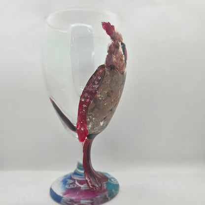 Hand-painted 16 oz goblet with a fluffy female cardinal perched on the bowl and tail feathers extending down the stem