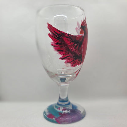 Hand-painted 16 oz goblet with a bold red cardinal facing forward and spreading his wings