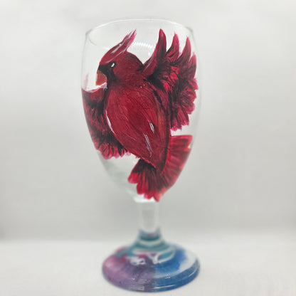 Hand-painted 16 oz goblet with a bold red cardinal facing forward and spreading his wings