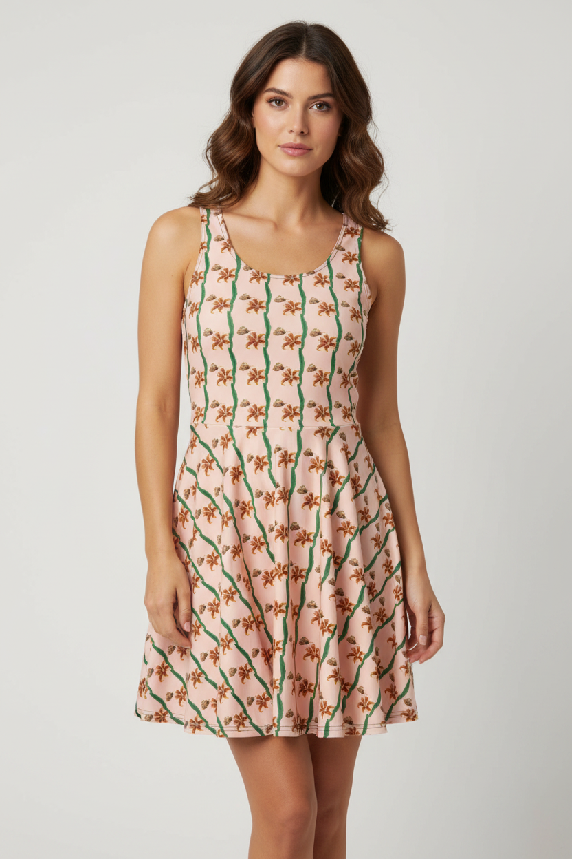 Pink floral skater dress featuring red lilies, green vertical stems, and golden butterfly from Fire Lilies botanical collection design.